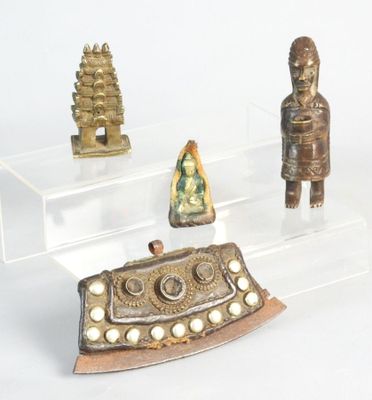 several pieces of art are displayed on clear acrylic stands