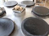 many pots and pans that are on the table