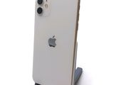 a close up of an iphone with a camera on a stand