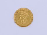 an image of a gold coin on a white surface