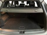 a trunk of a car with the back seats folded down