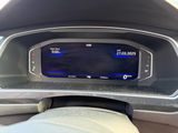the dashboard of a car with a digital display in the center