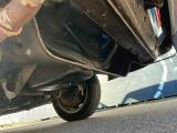 a close up view of a car ' s exhaust pipe