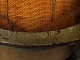 a close up of a piece of cloth on top of a spool