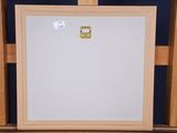 a picture of an easel with a white board on it