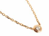 an image of a gold necklace with a diamond on a chain