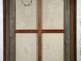 an old wooden window with a glass pane in it