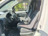 a picture of the inside of a van with the driver ' s seat up