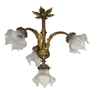 an image of a chandelier with three white flowers on it