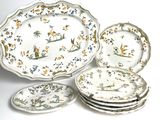a group of plates that have different designs on them