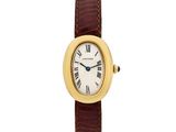 a close up of a wrist watch with roman numerals on it