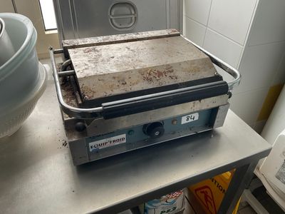 an image of a stove with a pan on top of it