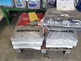 many bags of food sitting on a pallet in a warehouse