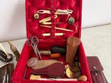 a red suitcase with a bunch of tools inside of it