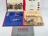 three children ' s books are sitting on a white surface