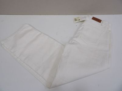 the pants are white and have a brown label on them