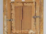 an old picture frame with a piece of paper taped to the side of it