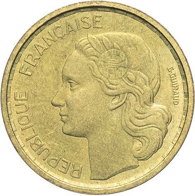 a close up of a coin with a woman ' s face on it
