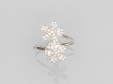 a diamond cluster ring, by van cleef