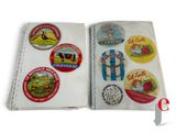 a book with a bunch of stickers on it