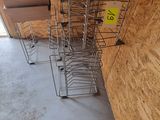 many carts that are lined up against the wall