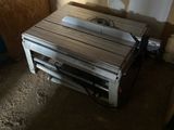 a toaster oven sitting in the middle of a room