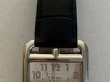 an image of a wrist watch on display on a table