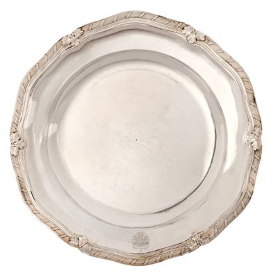 an image of a silver plate with rope around it on a white background