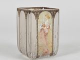 a glass vase with a picture of a woman on it