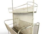 an image of a metal shelf with a basket on it