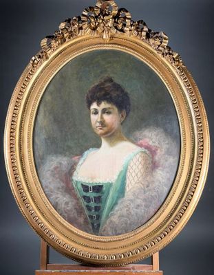 portrait of a woman in a green dress in a gold frame