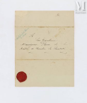 un gros plan d'un morceau de papier portant un cachet de cire