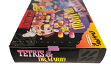 a box of tetris and the mario game on the table