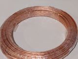a coil of copper wire sitting on a table