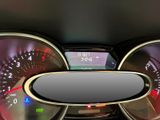 a close up of a car dashboard with a speedometer
