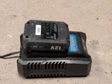 two batteries on top of each other on the ground