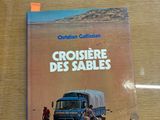 un livre posé sur une table, avec l'image d'un camion