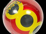 a red and yellow ball with a mickey mouse face on it