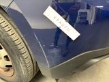 a close up of a car with a sticker on it ' s bumper