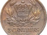 a close up of a coin with a crown on it