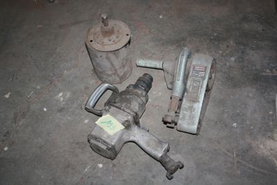 a lot of tools that are laying out on the floor