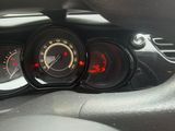 a car dashboard with a speedometer and gauges on it