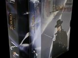 two boxed boxes with the cover of a movie and the cover of a movie