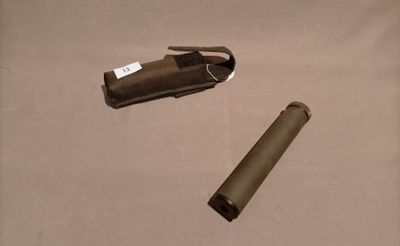 a lighter and a lighter case sitting on a table