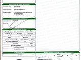 a green and white document with a barcode on it