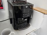 a coffee maker sitting on a counter in a kitchen