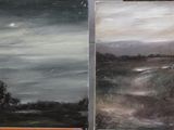 three paintings of different colors on the wall