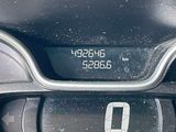 a close up of a car dashboard with a speedometer