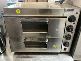 an image of a stainless steel oven sitting on a counter