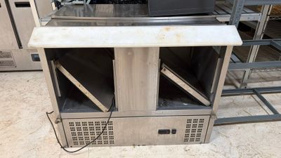 a microwave sitting on top of a counter in a kitchen